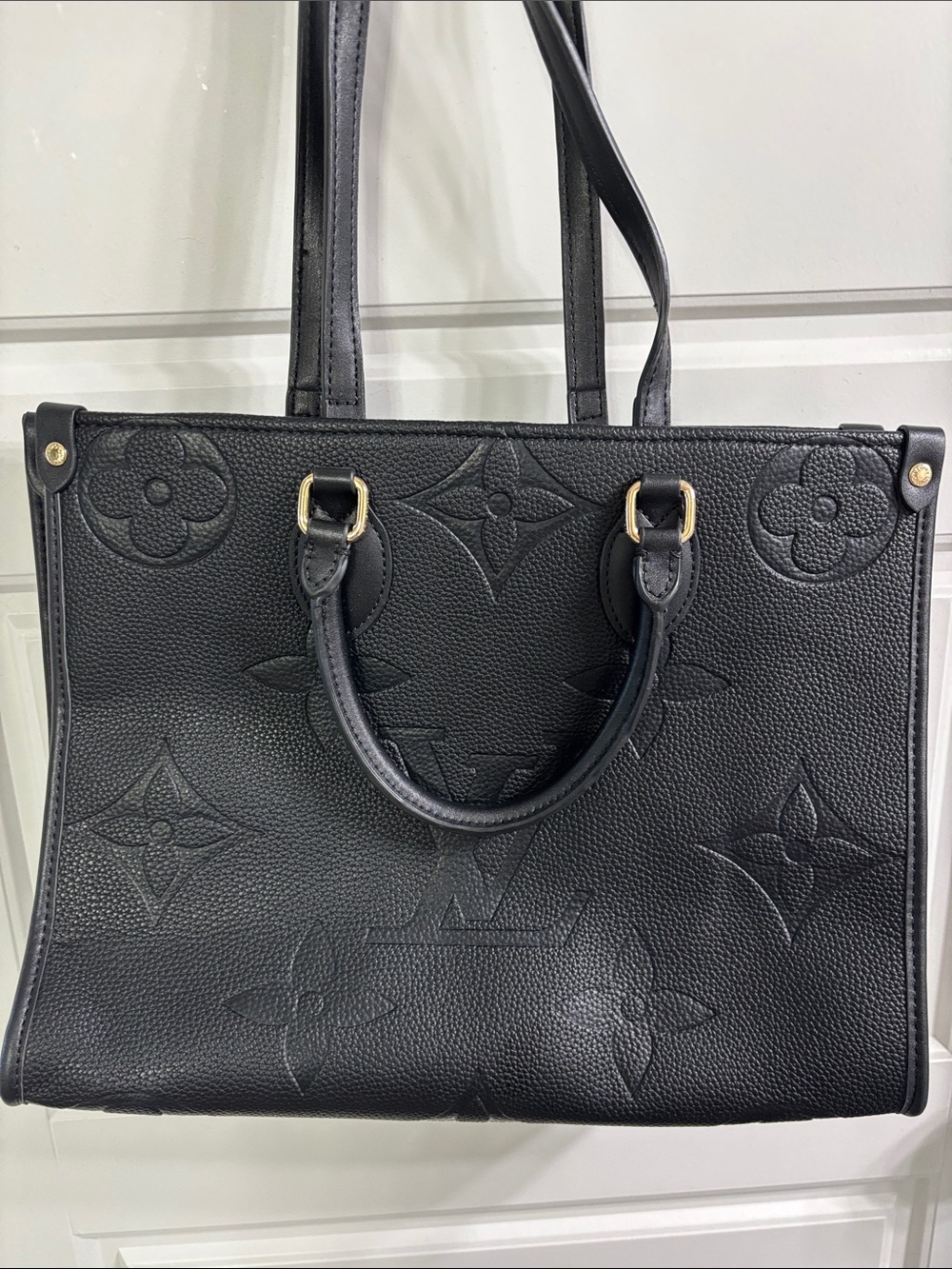Louis Vuitton Black Embossed Monogram Tote with Gold-Tone Accents
